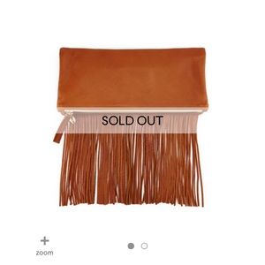 Clare V. Leather Fold-Over Fringe tan Clutch in great condition plus dust bag